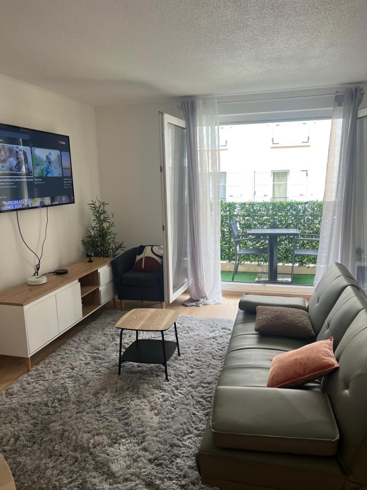 Champion Suites Sarcelles Pokoj fotografie